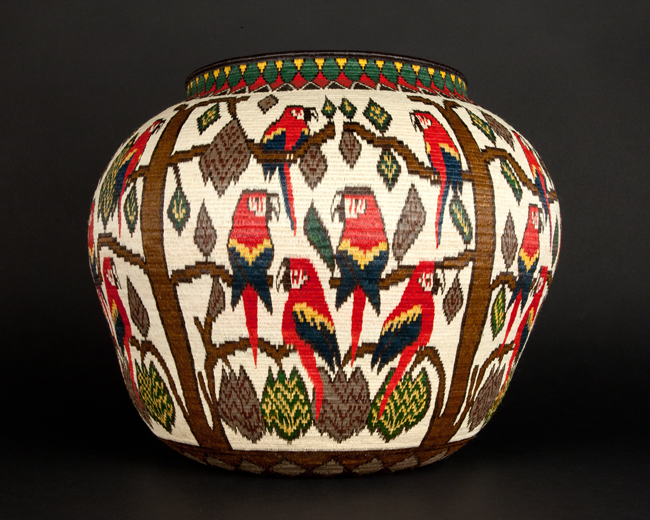 red blue parrots on trees basket