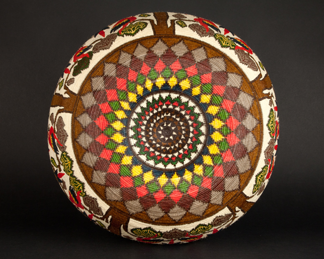 red blue parrots on trees basket