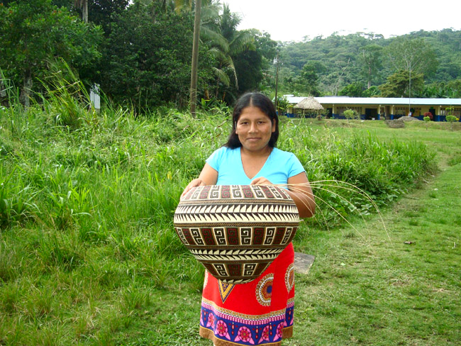 colorful geometric Wounaan basket in progress